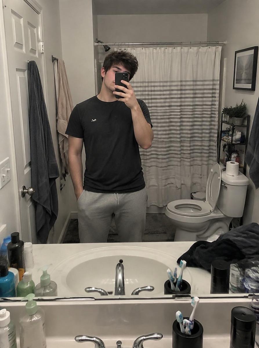 Shirtless bathroom mirror selfie
